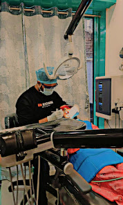 Dentist treating a patient at Rajdhani Dental Clinic in Ranchi